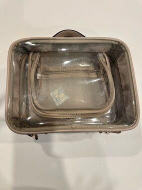 Calpak Clear Cosmetic Train Case with Beige Trim